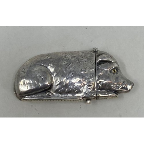 536 - A novelty silver vesta, in the form of a pig