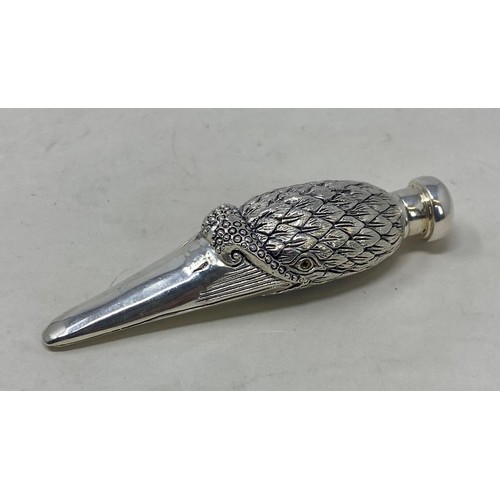 555 - A novelty silver coloured metal scent bottle, in the form of a bird's head