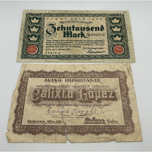 3 - A Bank of England white £5 banknote, March 27th 1950, R10 099867, a group of German 100,000 Mark ban... 