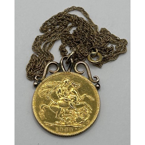 7 - An Edward VII gold sovereign, 1909, mounted as a pendant, on a 9ct gold chain