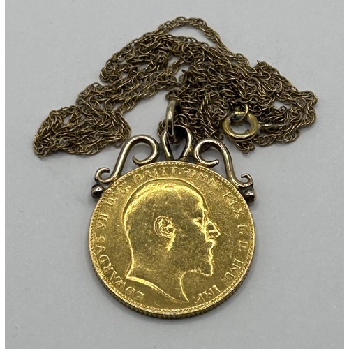 7 - An Edward VII gold sovereign, 1909, mounted as a pendant, on a 9ct gold chain