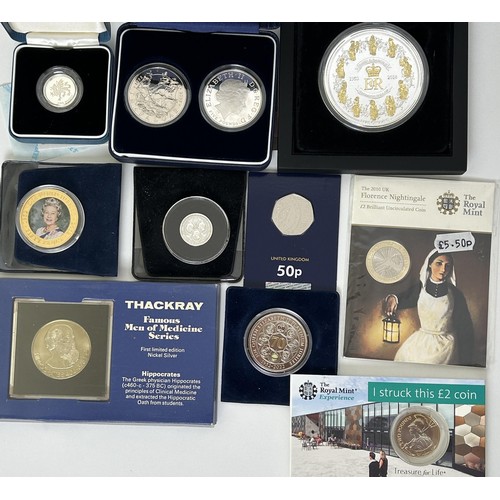 22 - A 1/8th sovereign, 2022, other assorted commemorative coins and medallions