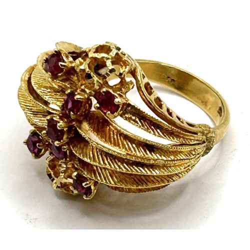 507 - An 18ct gold and ruby ring, ring size M, 12g all in