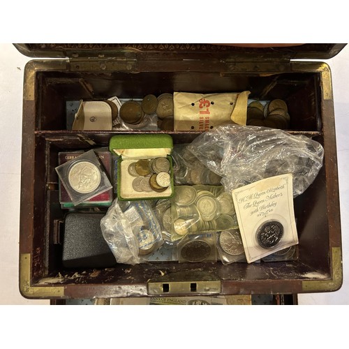 25 - A Queen Victoria crown, 1900, another, 1889, other coins and banknotes, in a mahogany box