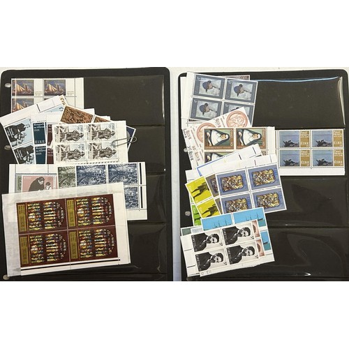 115 - A collection of Ireland stamps, including 1929-1962 commemoratives in blocks of four, u/m in a stock... 