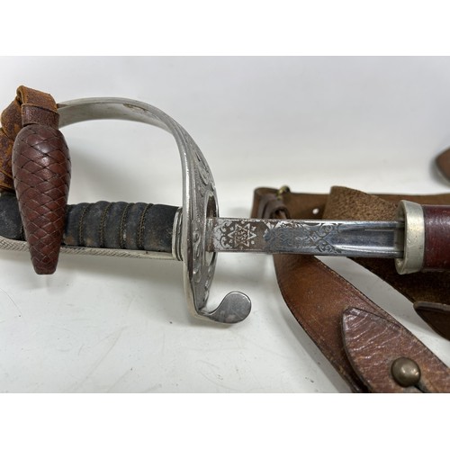 53 - An unusual Edward VIII short sword, the etched blade by Wilkinson Sword, having a wire bound fishski... 