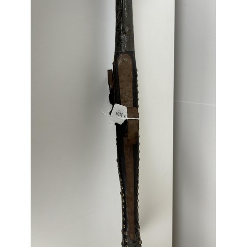 54 - A 19th century Moroccan flintlock gun, 145 cm long