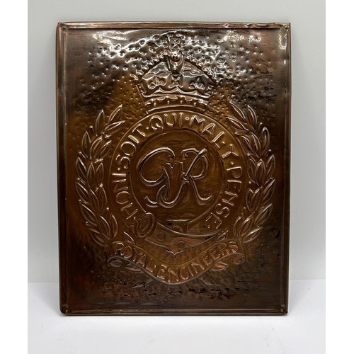 57 - A pewter table cigarette box, with hammered decoration, the lid applied a Royal Engineers plaque, 10... 