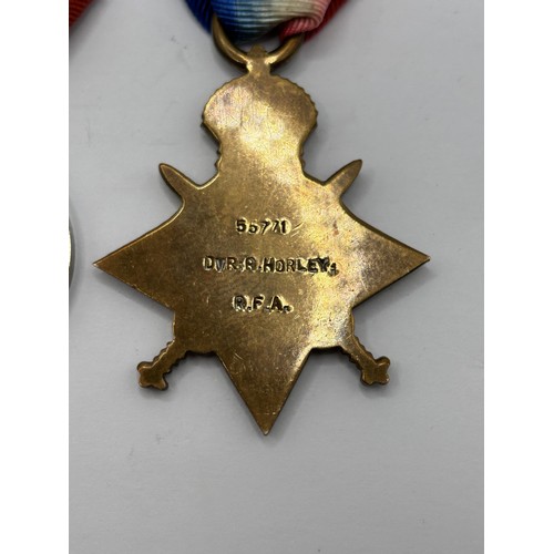 72 - A 1914-1915 Star Trio, awarded to 55771 Dvr R Horley RFA, and an Imperial Service Medal, issued to W... 