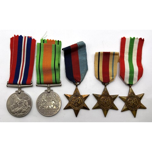 73 - A group of five medals, comprising a 1939-1945 War Medal, 1939-1945 Defence Medal, Italy Star, Afric... 