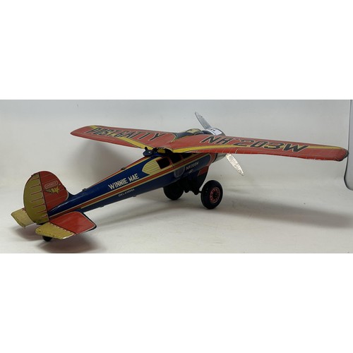 159 - A Japanese wind up tinplate aeroplane, 41 cm wide