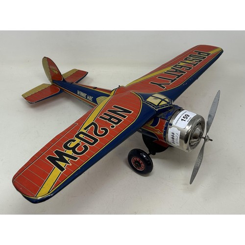 159 - A Japanese wind up tinplate aeroplane, 41 cm wide