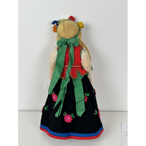 162 - A mid-20th century Continental felt doll, in traditional dress, probably be Lenci, boxed