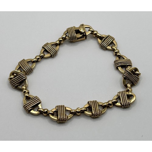 504 - A 14ct gold fancy link bracelet, 18 g