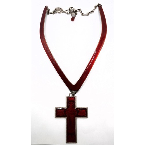 577 - A Jean Paul Gaultier red enamel cross pendant, on a red enamel silver coloured metal necklace