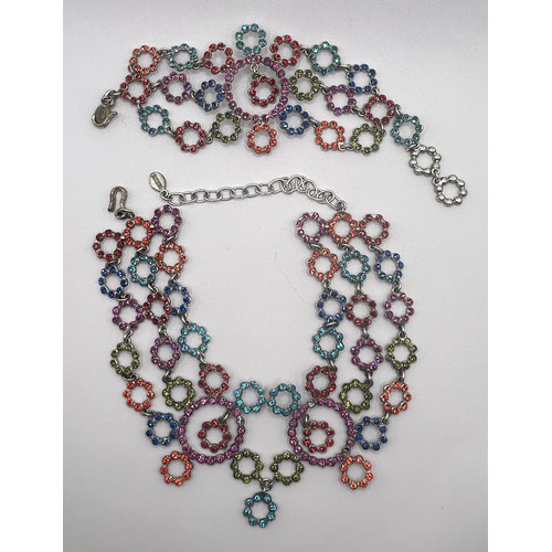 587 - A Jean Paul Gaultier multi coloured paste set necklace, and a matching bracelet