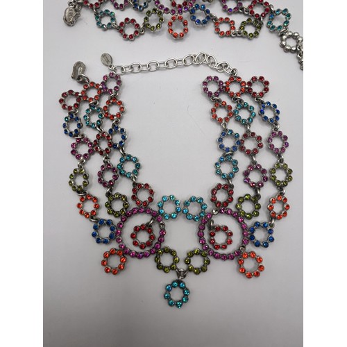 587 - A Jean Paul Gaultier multi coloured paste set necklace, and a matching bracelet