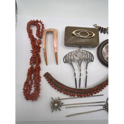 593 - An Indian gilt metal and coral tiara, an Art Deco bracelet, an Art Nouveau style hair pin, and assor... 