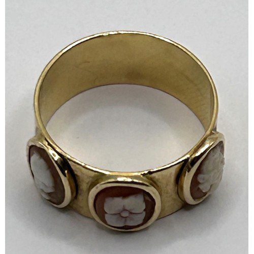 597 - An 18ct gold ring, inset with three oval cameos