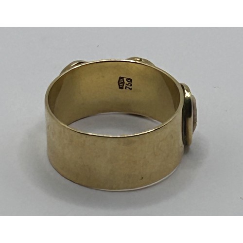 597 - An 18ct gold ring, inset with three oval cameos