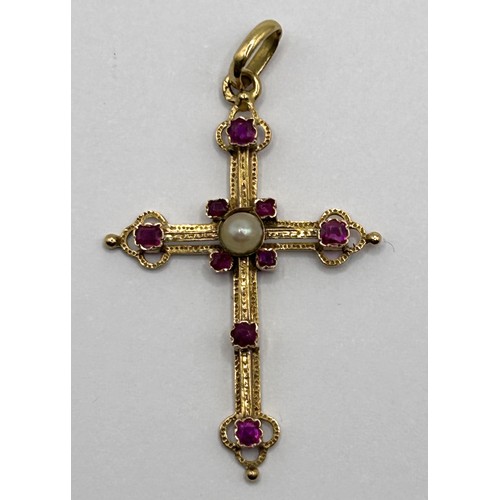 599 - A late 19th/early 20th century gold, cultured pearl and red stone cross pendant