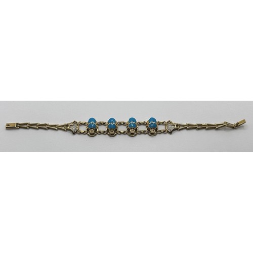 630 - An Egyptian style gold and turquoise bracelet, in the form of a scarab beetle