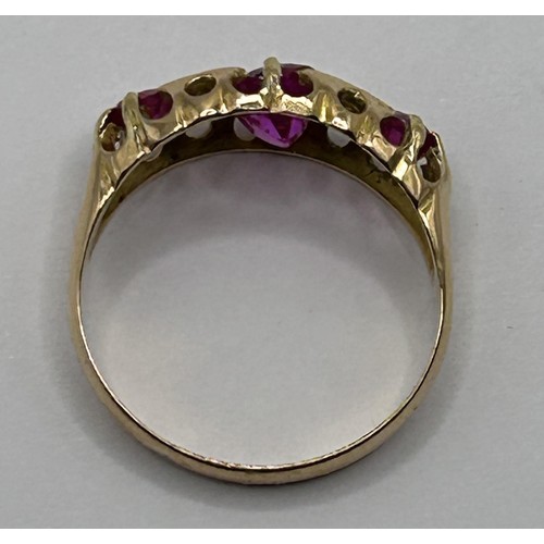 633 - An 18ct gold, diamond and pink saphire ring