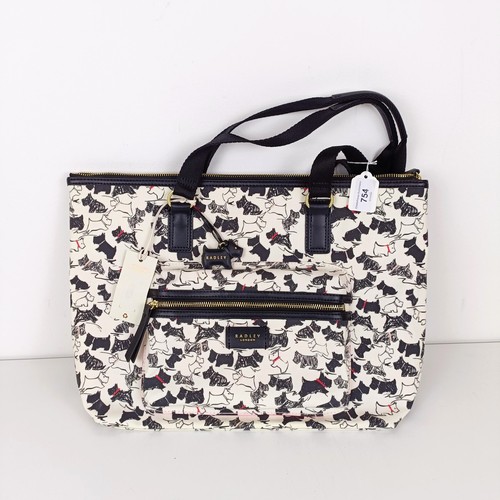 754 - A Radley handbag, with a black and white Scottie dog pattern, new and unused