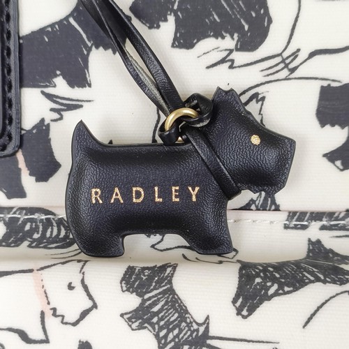 754 - A Radley handbag, with a black and white Scottie dog pattern, new and unused