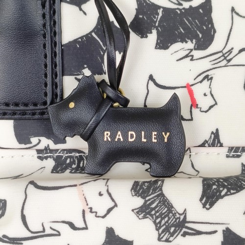 754 - A Radley handbag, with a black and white Scottie dog pattern, new and unused