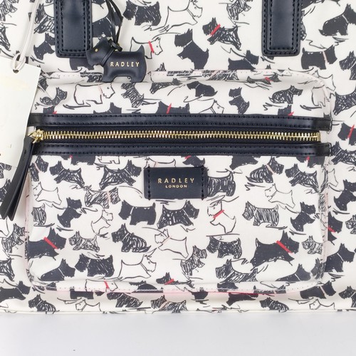 754 - A Radley handbag, with a black and white Scottie dog pattern, new and unused