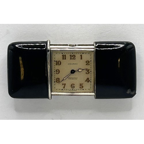 611 - A silver Movado Ertmo purse watch, with black enamel decoration, the silvered dial with Arabic numer... 