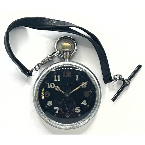 613 - A Jaeger-LeCoultre military open face pocket watch, the black dial with luminous Arabic numerals and... 