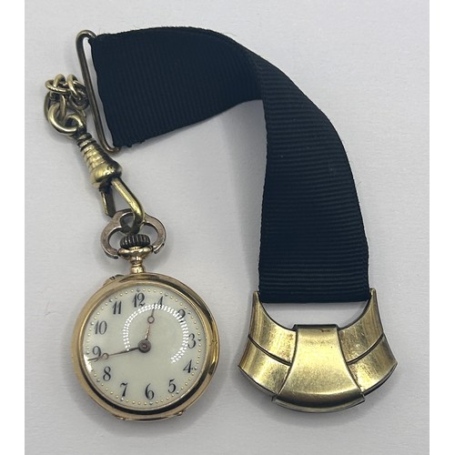 617 - A ladies 18ct gold fob watch, with Arabic numerals, the back with a coronet and initials set with di... 