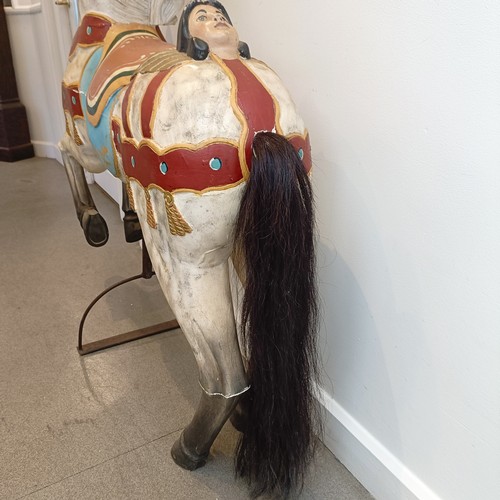 761 - A painted carousel type horse, 127 cm high