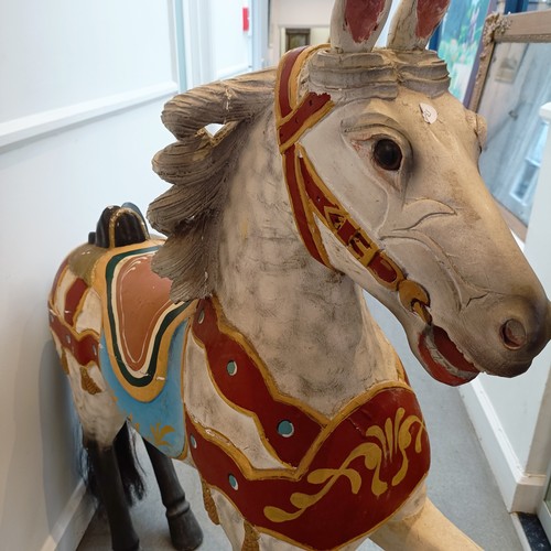 761 - A painted carousel type horse, 127 cm high