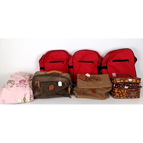 733 - A Brics travel bag, another, a vanity case, and a pair of child's curtains (qty)