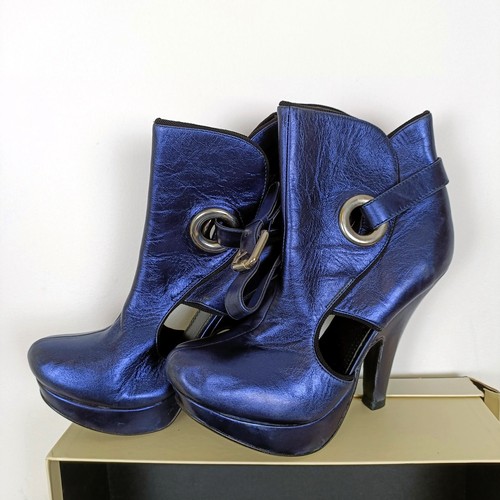 729 - A pair of Wunderkind high heeled shoes, size 41, boxed, a pair of Chloe shoes, size 41, a pair of Ch... 