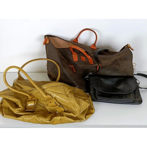 727 - A Brics bag, an Osprey handbag, and another handbag (3)