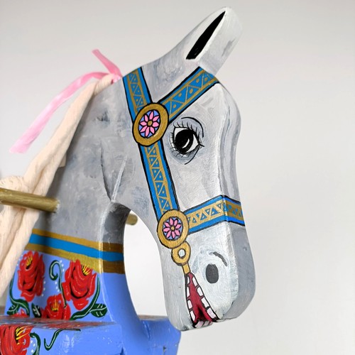 758 - A painted push along horse, 61 cm high