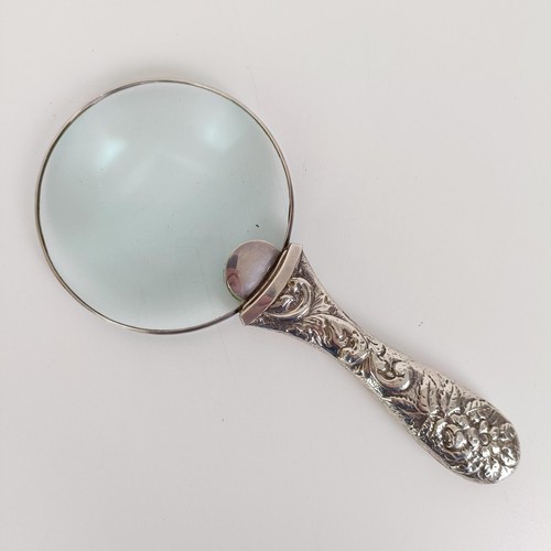 693 - A sterling silver mounted magnifying glass