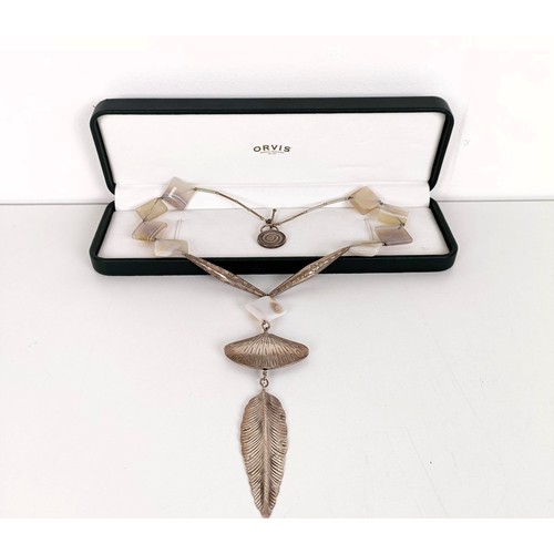 563 - A silver coloured metal and hard stone necklace, in an Orvis box