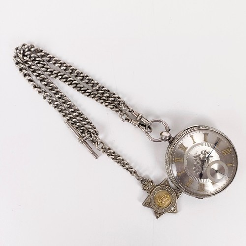 567 - A Victorian silver open face pocket watch, the silvered dial with yellow coloured metal Roman numera... 