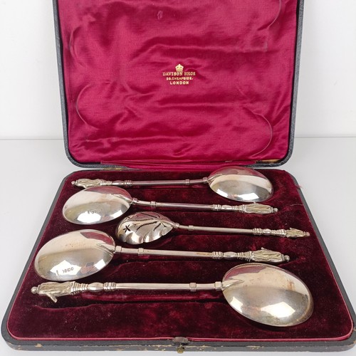 650 - A Victorian silver gilt fruit set, comprising four spoons, and a sifter spoon, with figural handles,... 