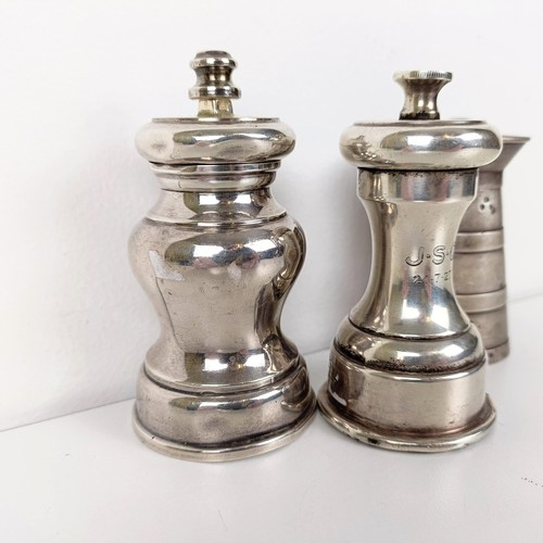 658 - A Victorian silver novelty peppermill in the form of a churn, London 1893, and two silver mounted pe... 