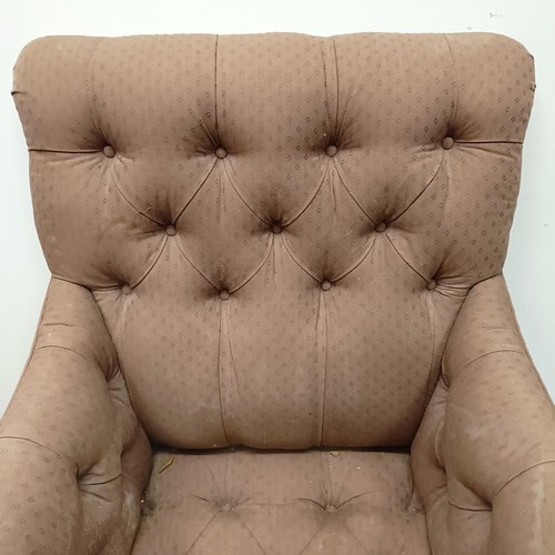 983 - An early 20th century button back library armchair