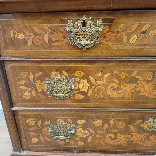 999 - A 19th century Dutch mahogany linen press, with floral marquetry decoration, the two cupboard doors ... 