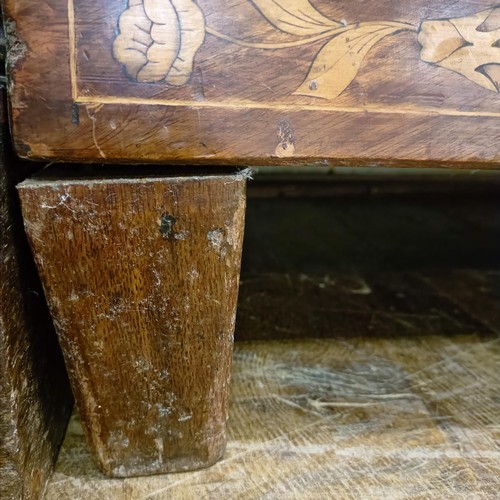 999 - A 19th century Dutch mahogany linen press, with floral marquetry decoration, the two cupboard doors ... 