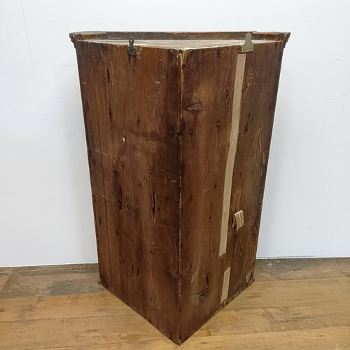 1002 - A mahogany hanging corner cabinet, 70 cm wide