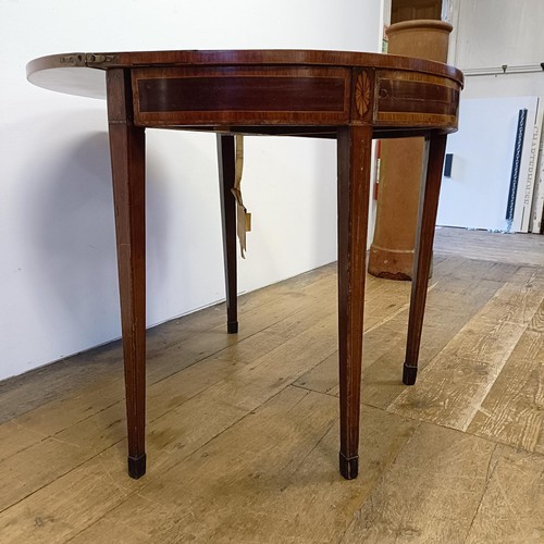 1007 - An inlaid mahogany demi-lune card table, 90 cm wide